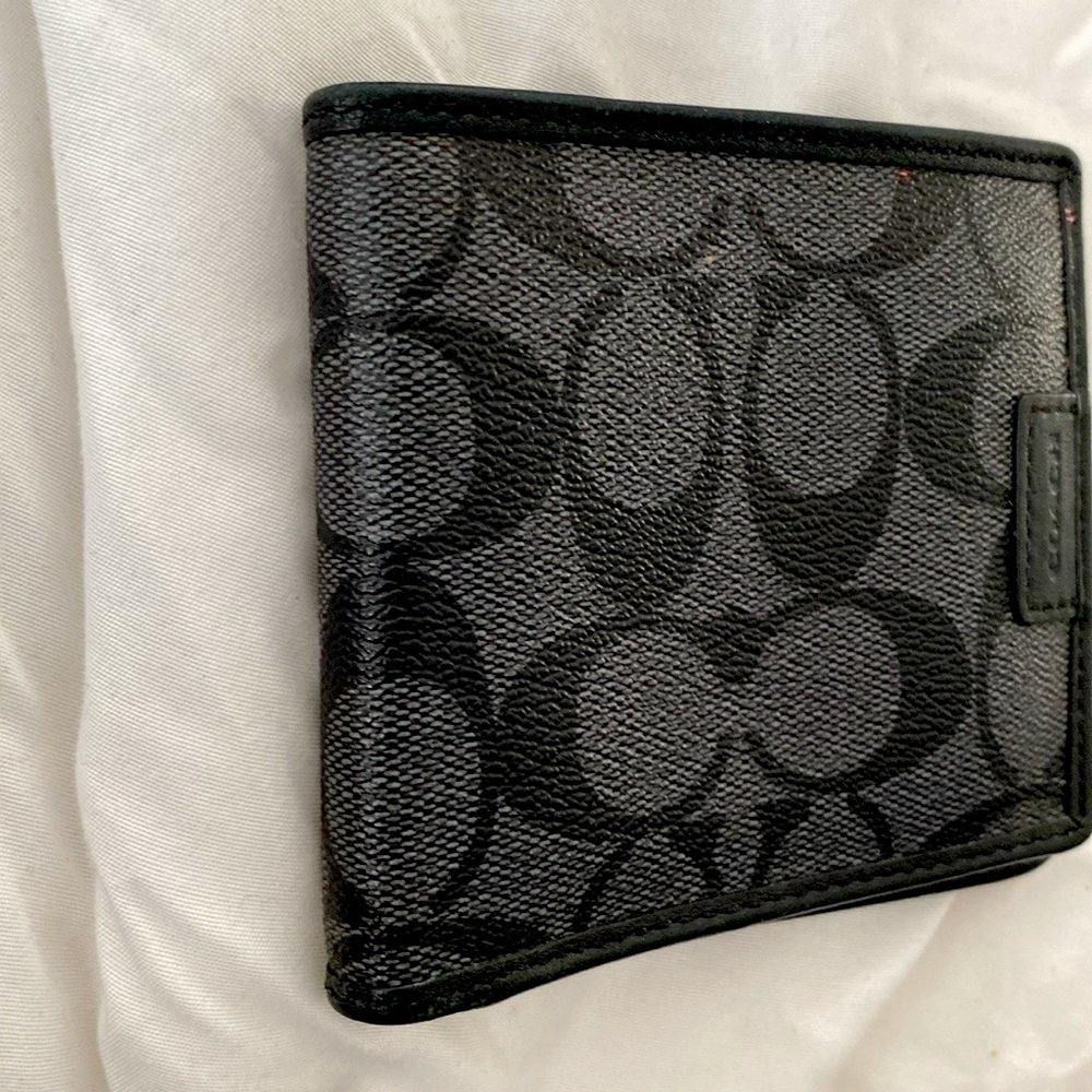 COACH black leather wallet with “C” print